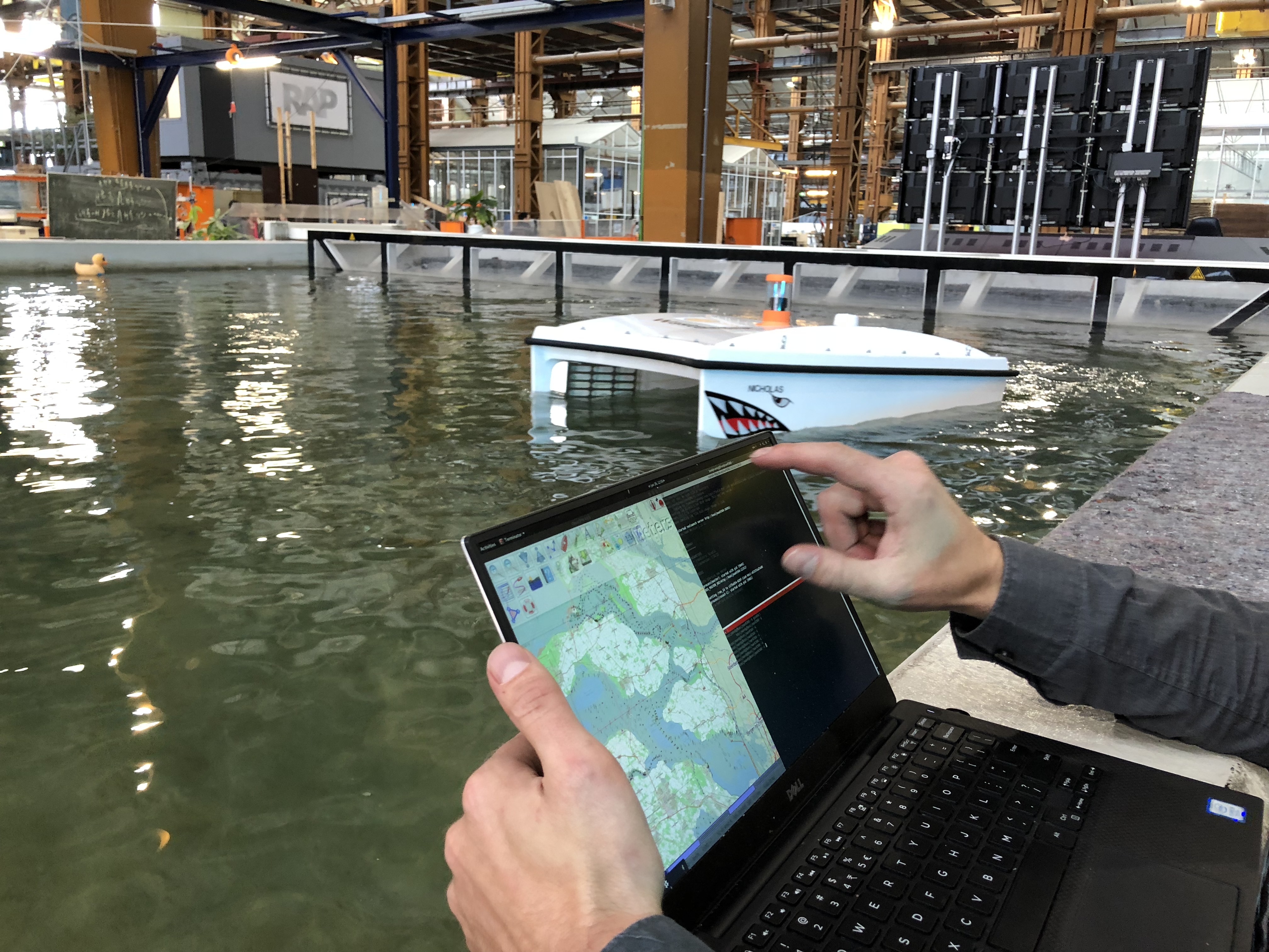 An early WasteShark being tested in the indoor water basin at RDM in Rotterdam