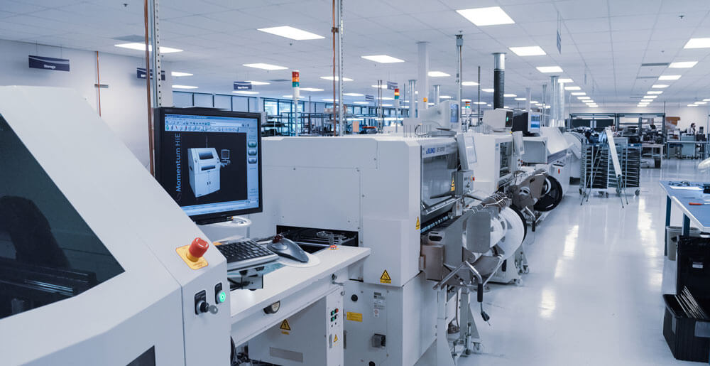 Machines on APCON’s manufacturing floor in Wilsonville, Oregon