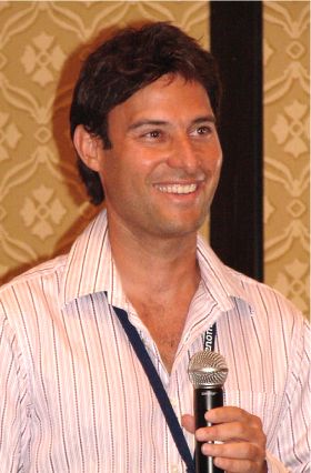 Richard Rosenblatt holding a microphone at the eNom Resellers Summit in Las Vegas in March 2007