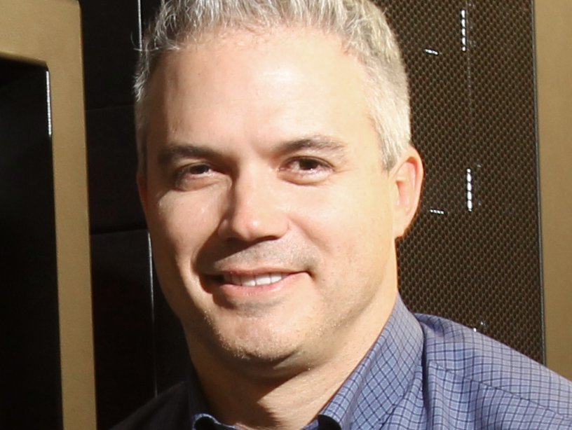 Rick Cantu beside data center equipment at Redapt