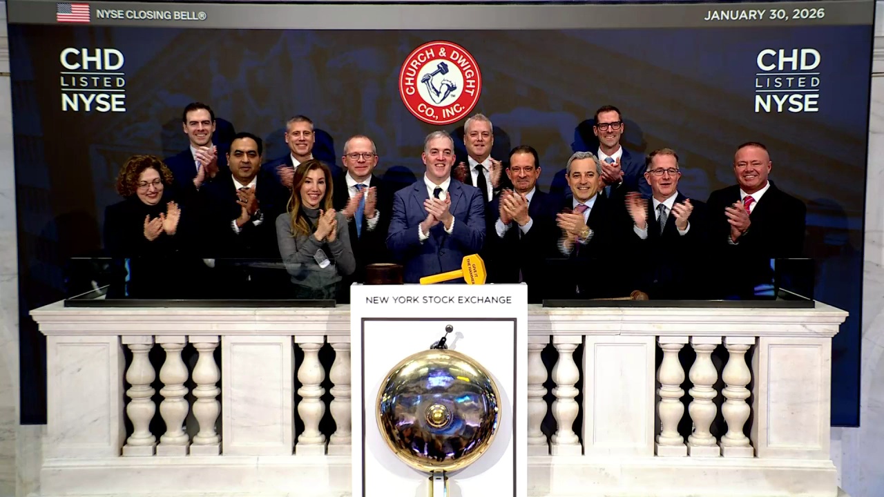 Rick Dierker and Church & Dwight colleagues at the New York Stock Exchange closing-bell podium