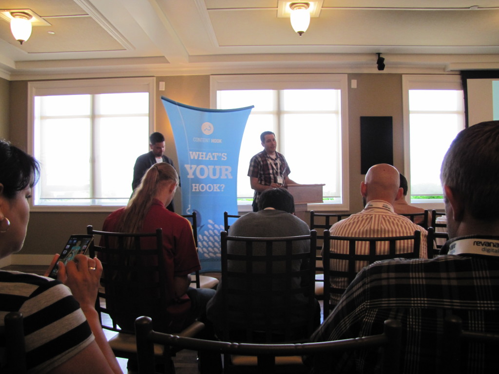 Rick Galán presenting to a seated audience at the 2015 Utah Digital Marketing Collective conference