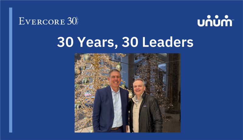 Rick McKenney and Tom Gallagher pictured beside a holiday tree at Evercore’s 30 Years, 30 Leaders gathering