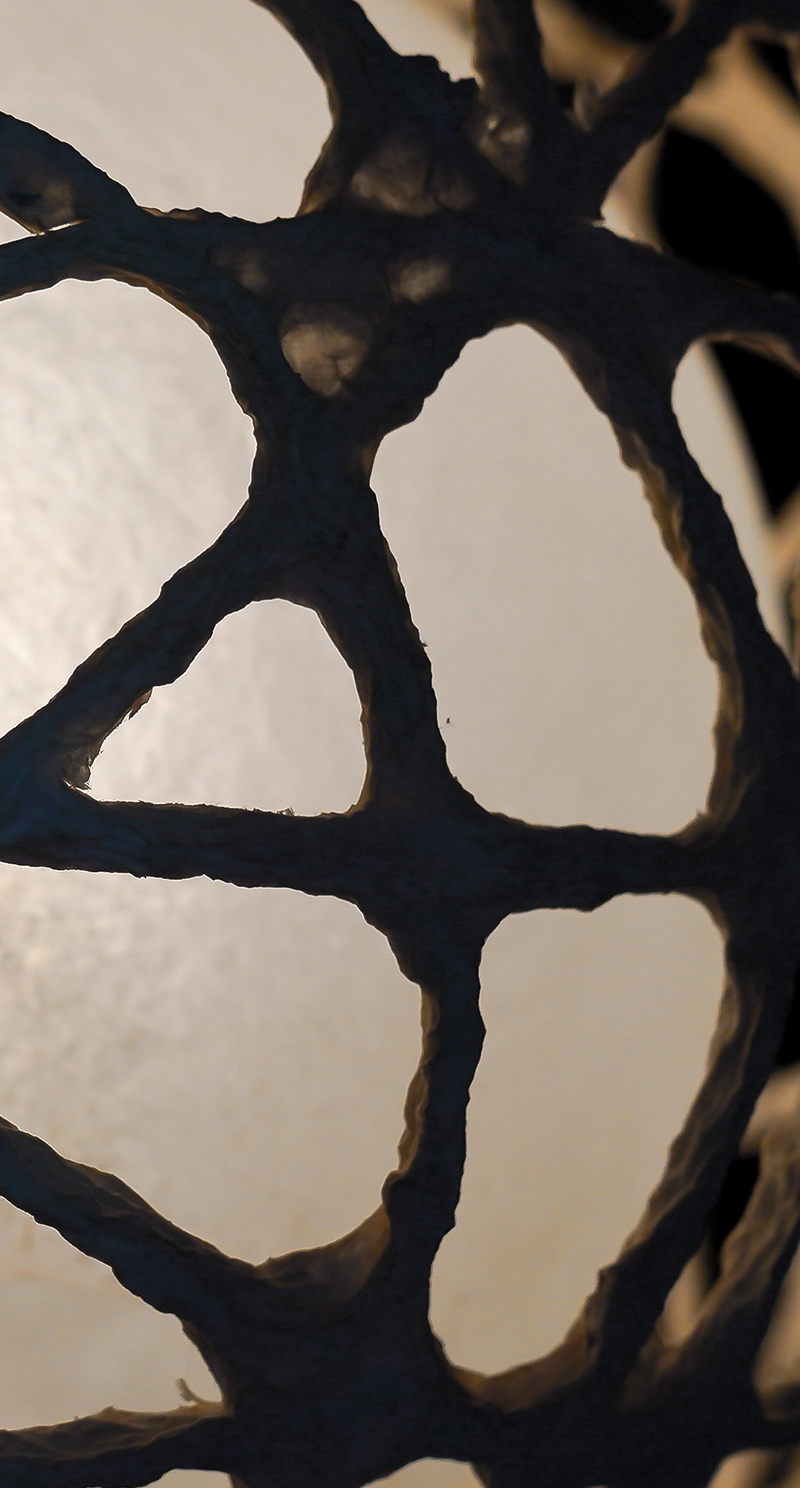 Close detail of an abstract bronze sculpture used on the Ridgely Walsh website