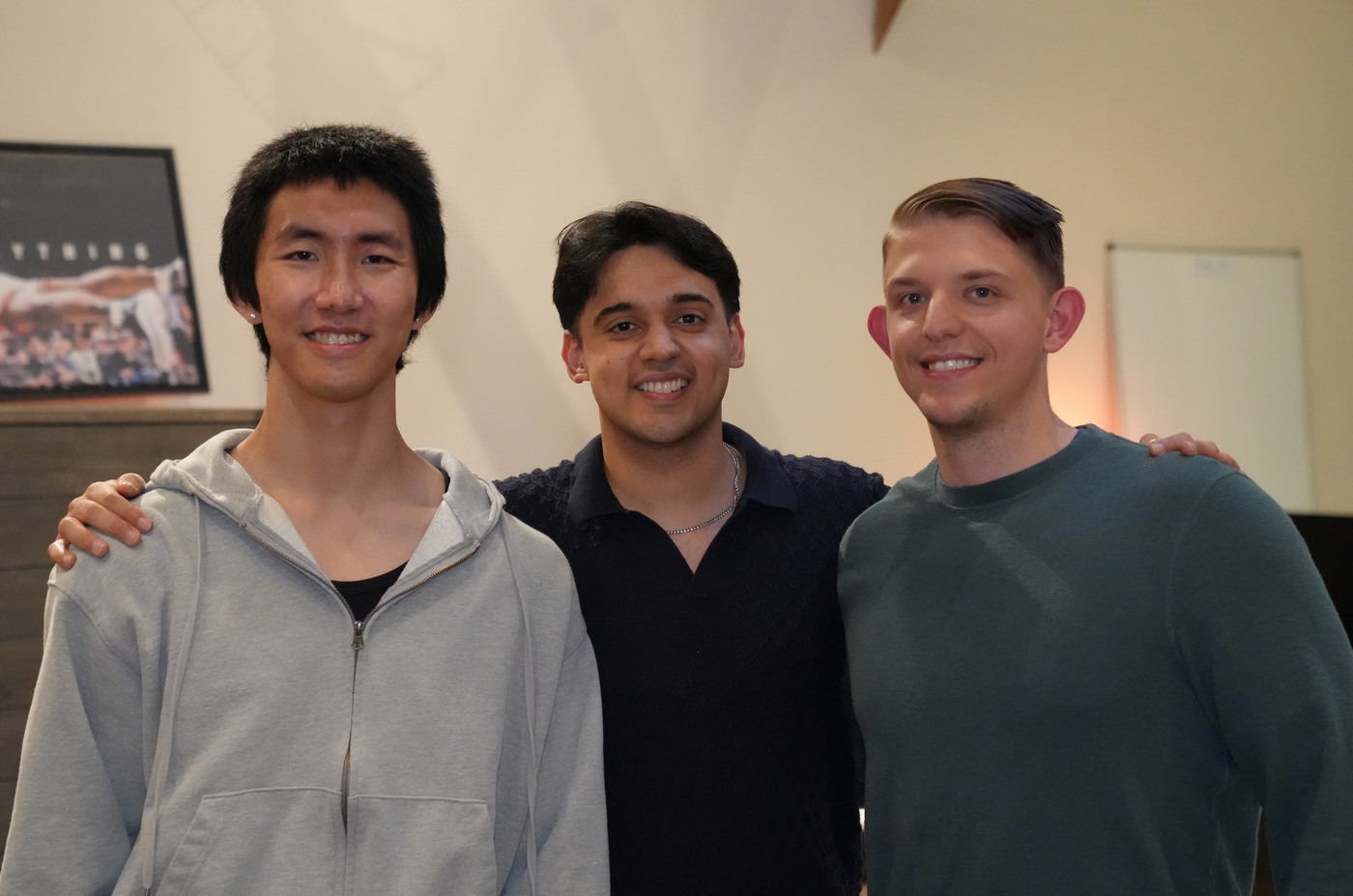 Vibecode co-founders Kehan Zhang, Ansh Nanda and Riley Brown standing together