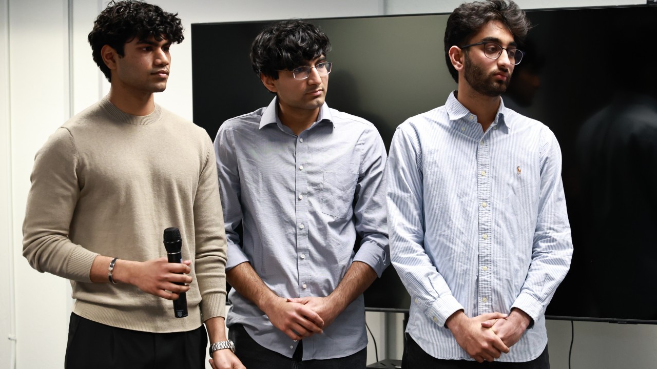 Three Zarna founders presenting at an early-2025 Silicon Valley pitch competition