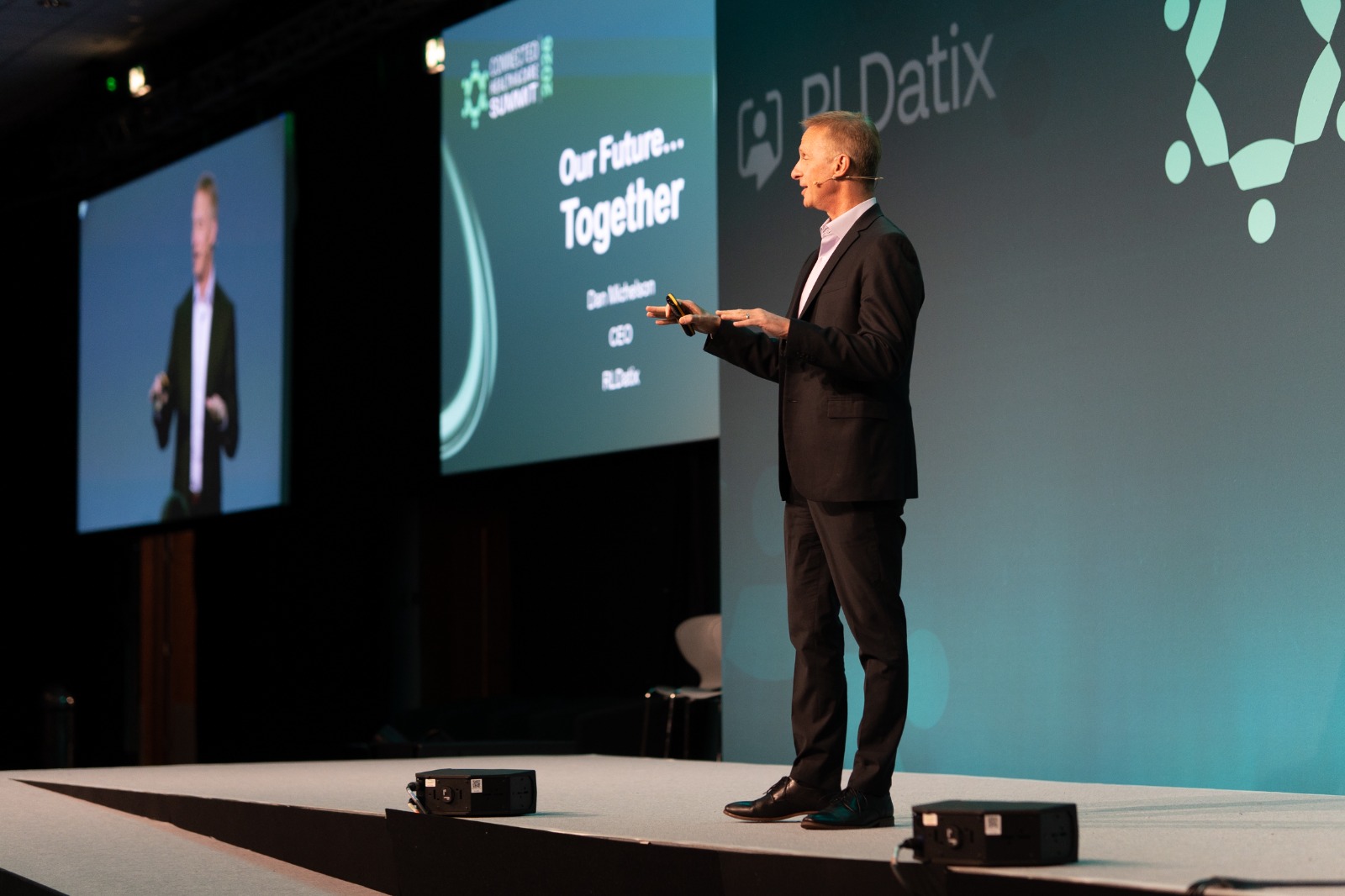 RLDatix CEO Dan Michelson speaking on stage