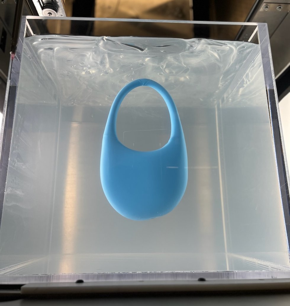 Blue silicone Ariel Swipe Bag made by Rapid Liquid Print for Coperni
