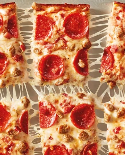 Slices of Detroit-style pepperoni pizza