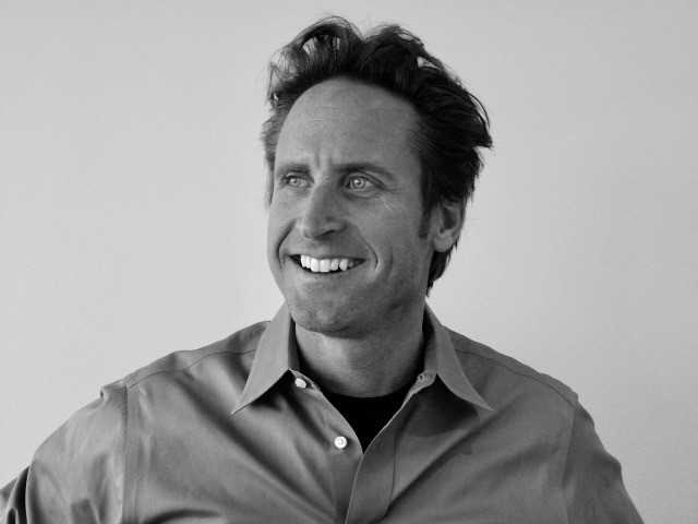 Black-and-white portrait of ROAR founder Jay Froberg