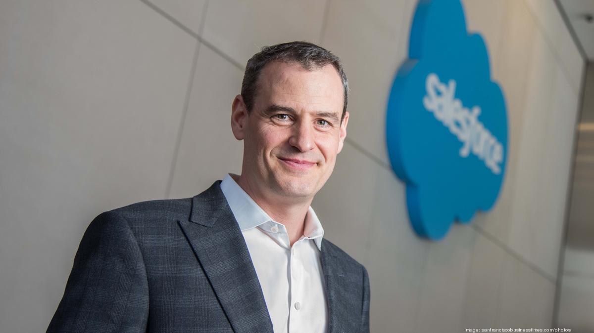 Rob Acker standing in a Salesforce office