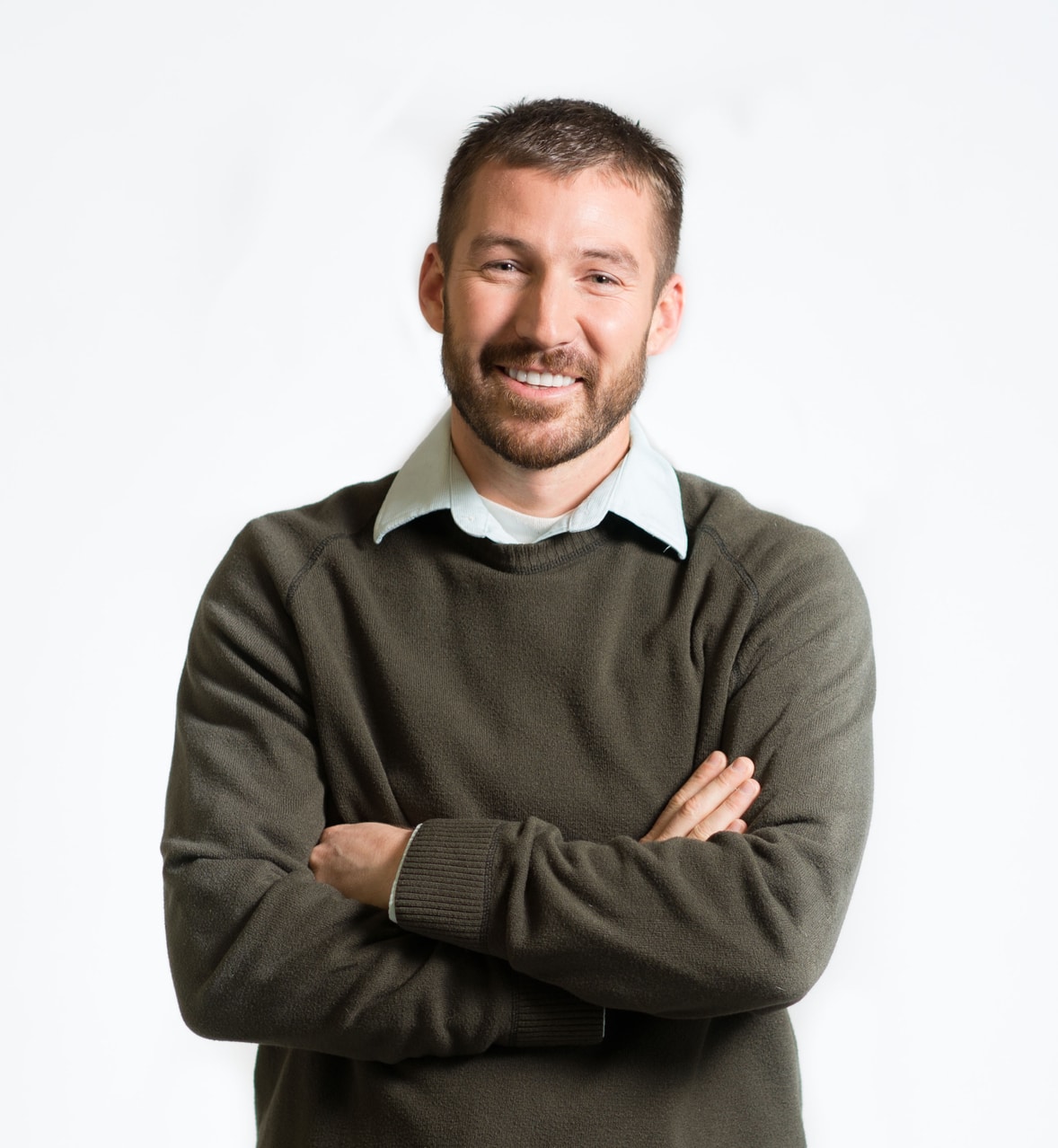 Black-and-white portrait of Rob Gaedtke smiling in a casual shirt