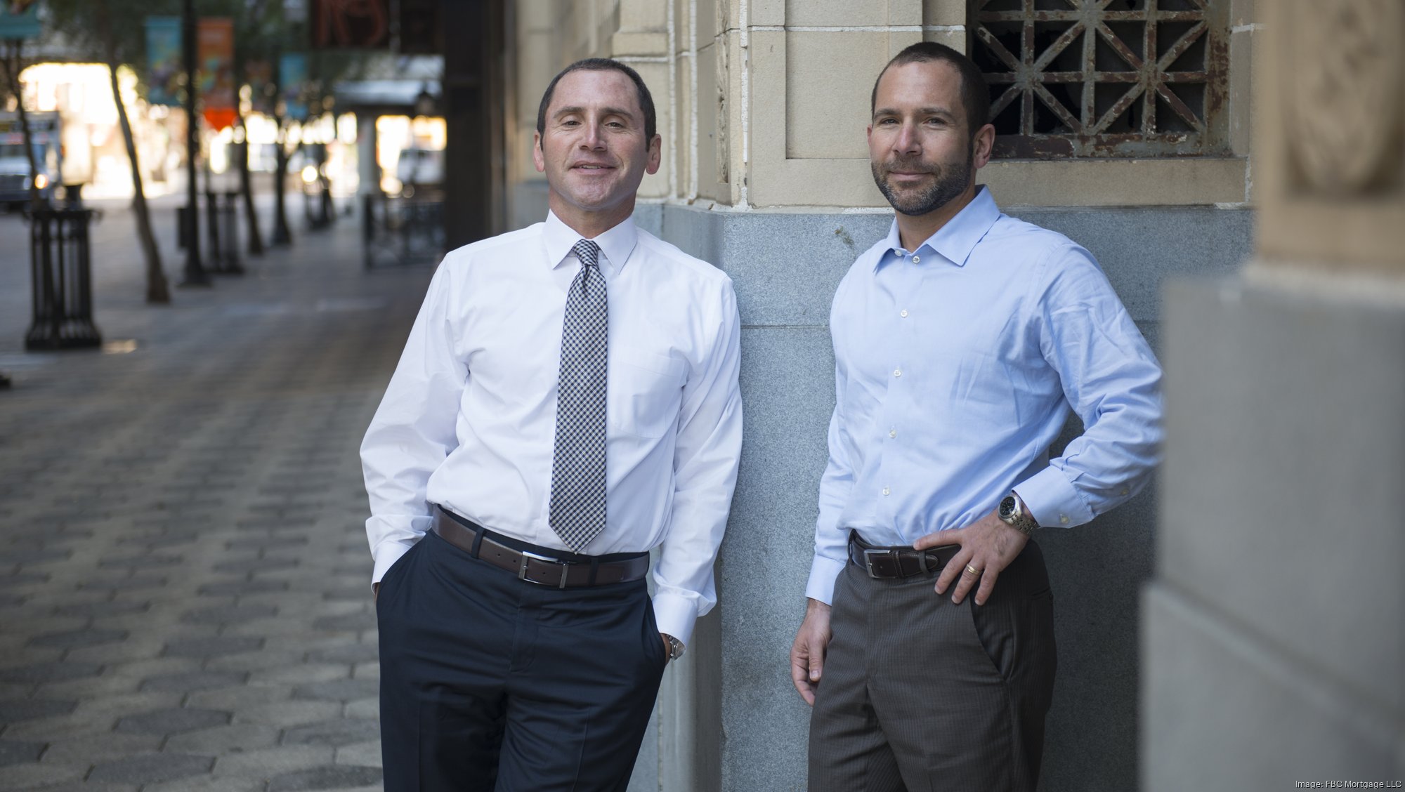 Joe Nunziata at left and Rob Nunziata at right, standing together on an Orlando sidewalk