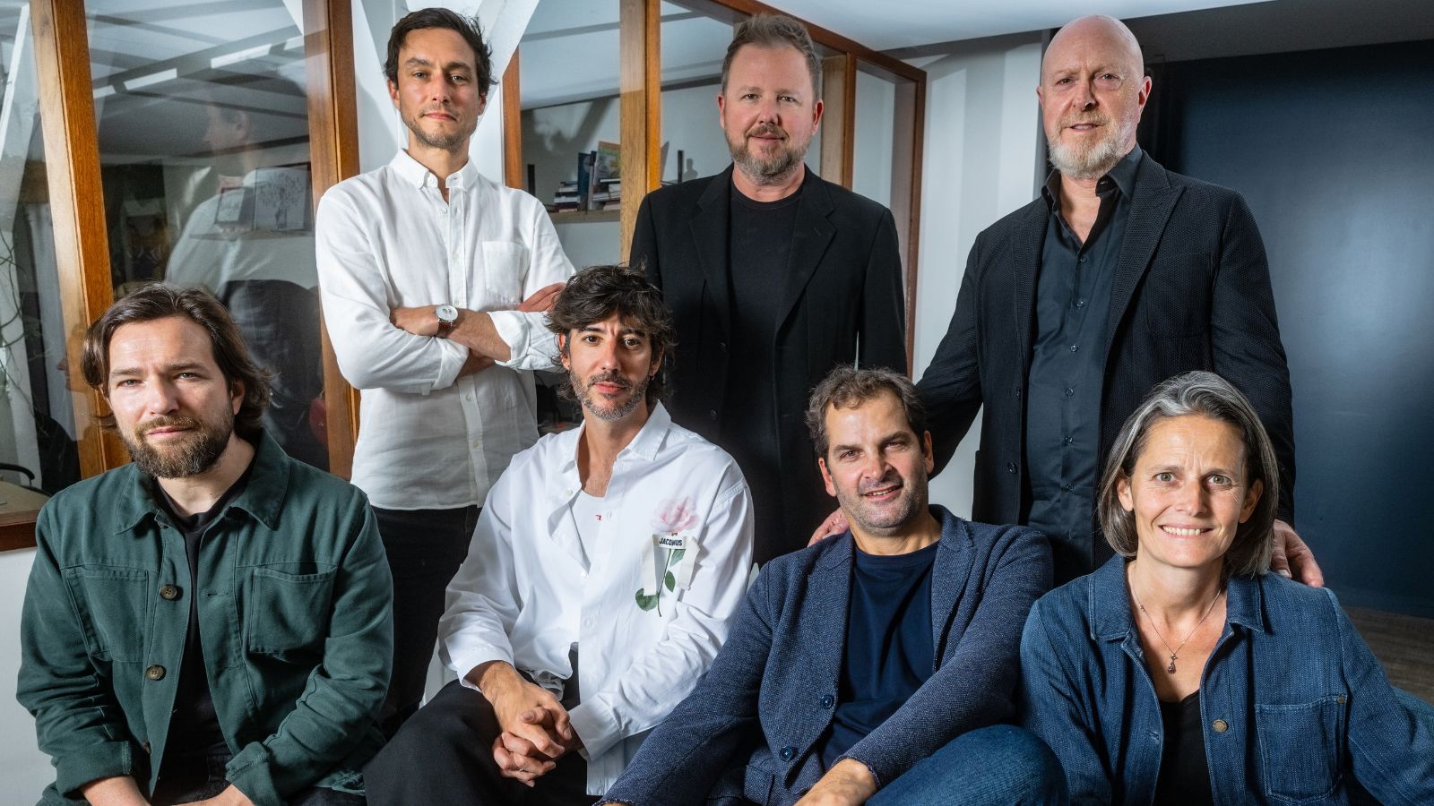 Robert G. Vallee Jr., standing at the back right, with Project and MNSTR colleagues