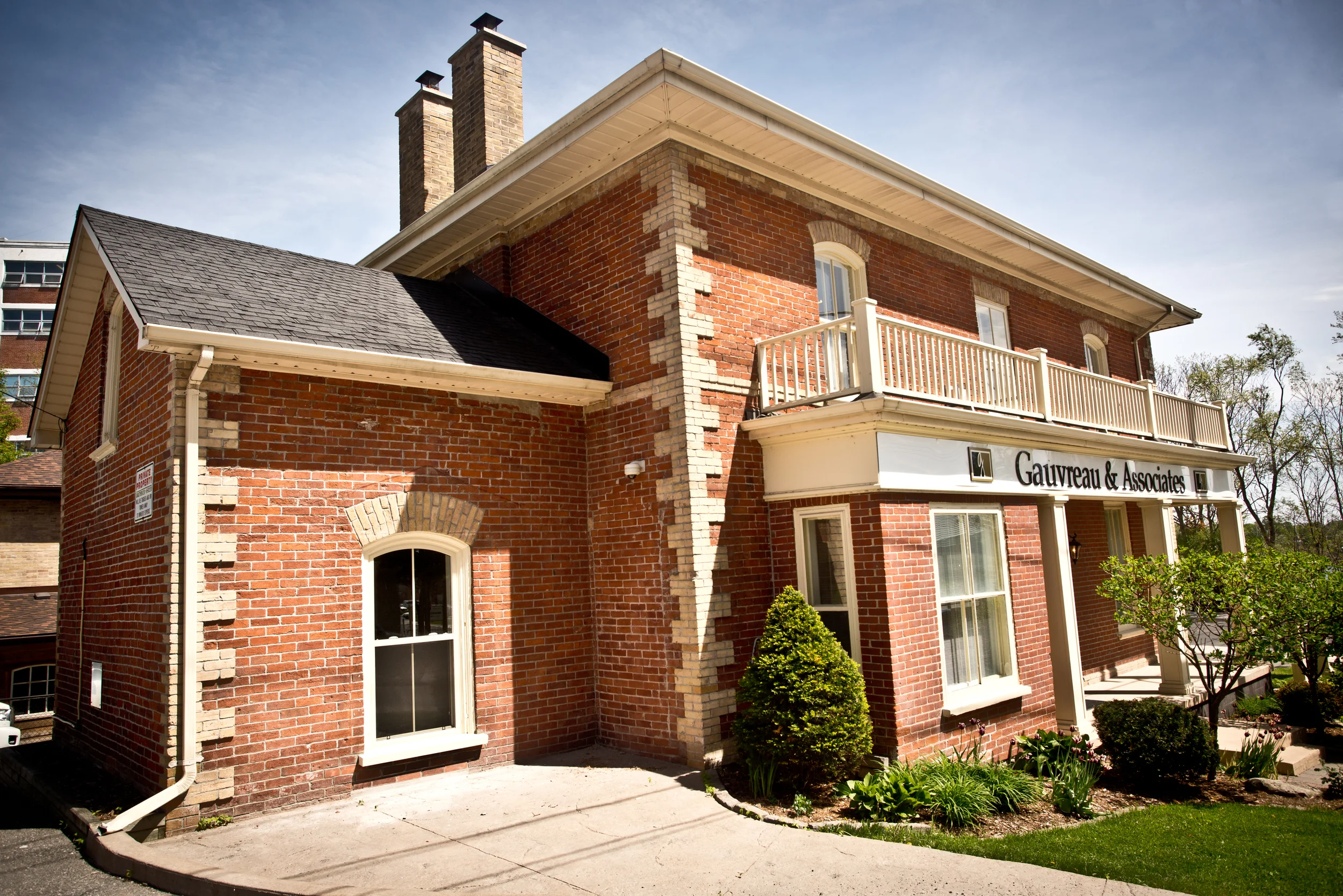 The red-brick former Gauvreau and Associates office on Hunter Street in Peterborough