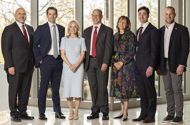 Robert Lowenthal, second from left, with fellow Olin honorees and Dean Mike Mazzeo at the 2025 alumni awards ceremony.