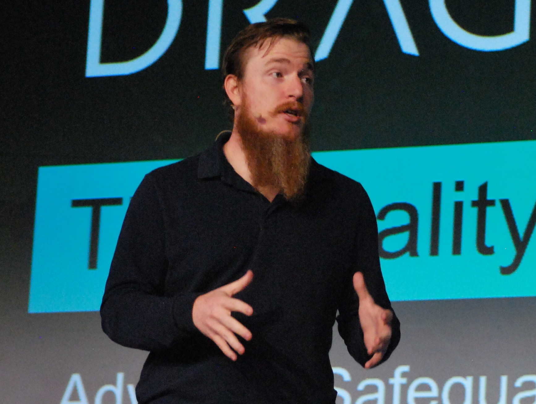 Robert M. Lee speaking onstage at Emerson Users Exchange in 2022
