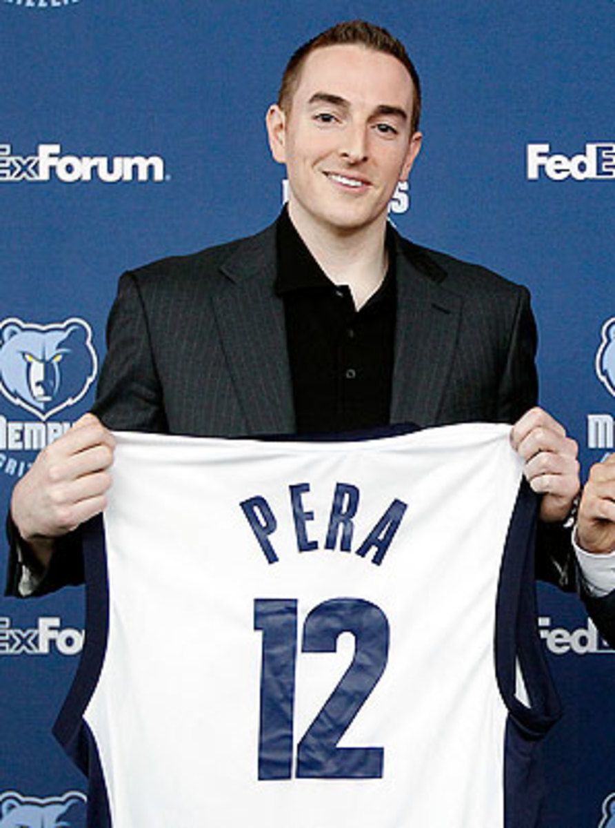 Robert Pera holds a Memphis Grizzlies jersey bearing his surname and the number 12 at his 2012 introduction.