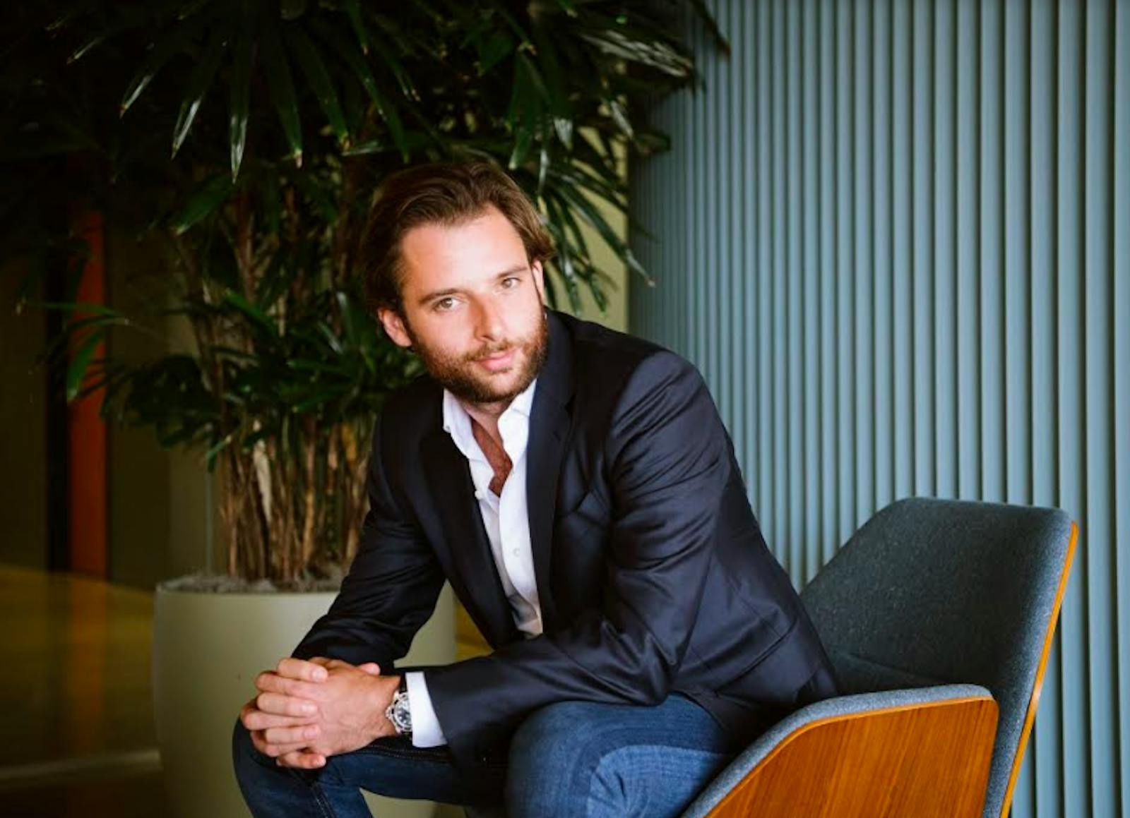 Robert Vis seated in an office in the photograph accompanying his 2018 founder interview