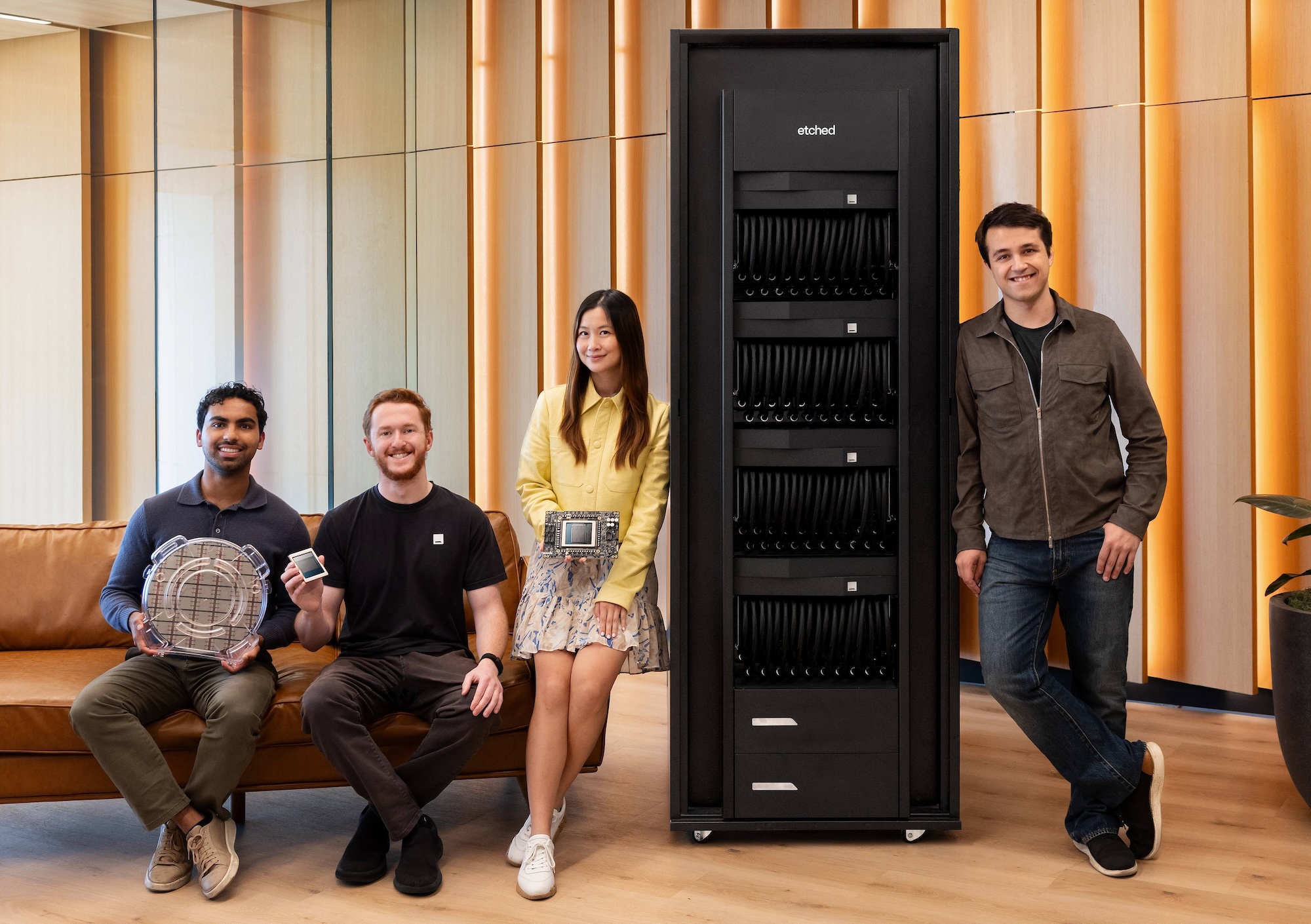 From left: Etched partner Abishek Malani, Robert Wachen, Sequoia partner Sonya Huang, and Etched co-founder Gavin Uberti beside an Etched rack