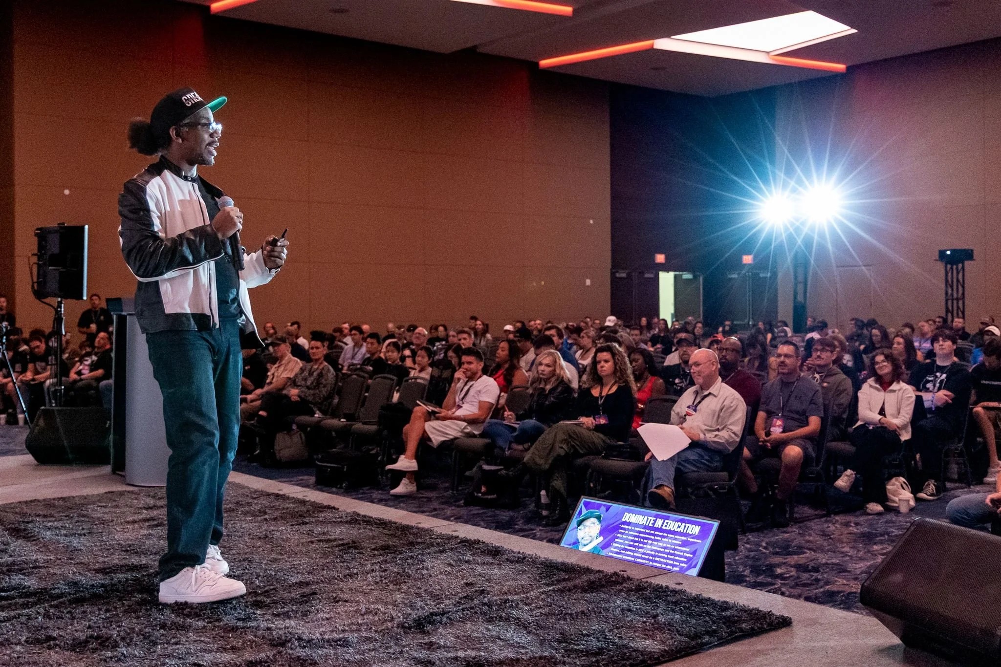Roberto Blake speaking onstage at VidSummit 2025
