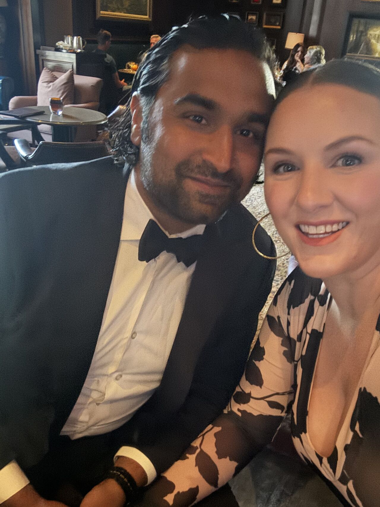Robin Shah and his wife Katy smiling together, dressed for the EY Southeast awards celebration