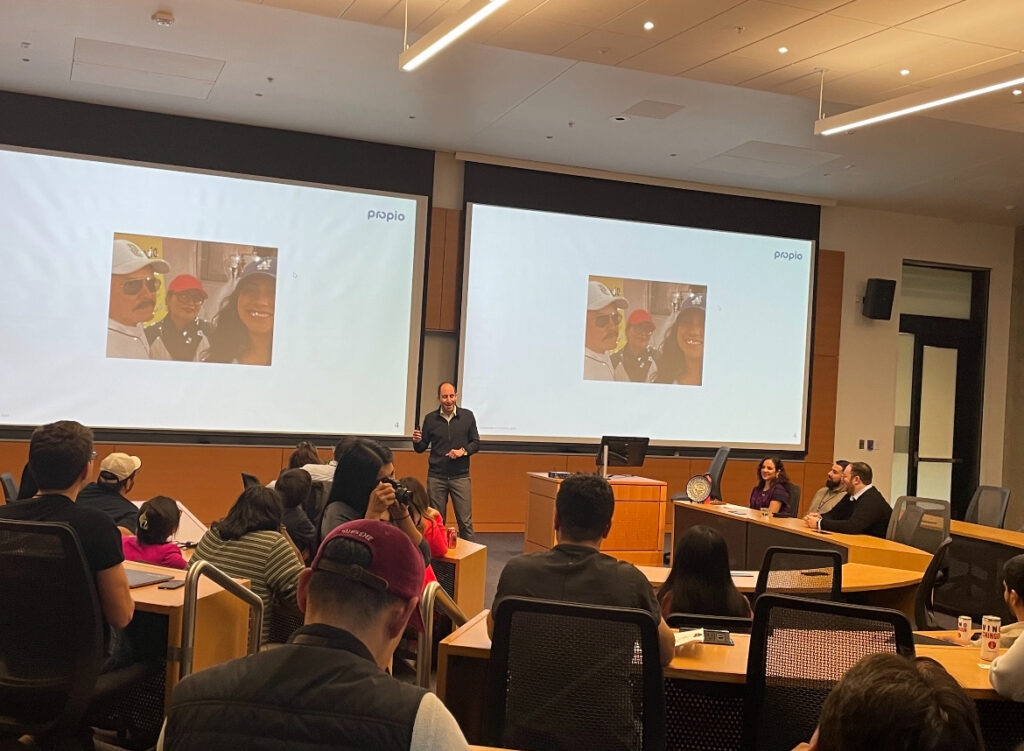 Rodrigo Carriedo presenting Araceli’s photograph to the audience at Pitch Latino Seattle in May 2024