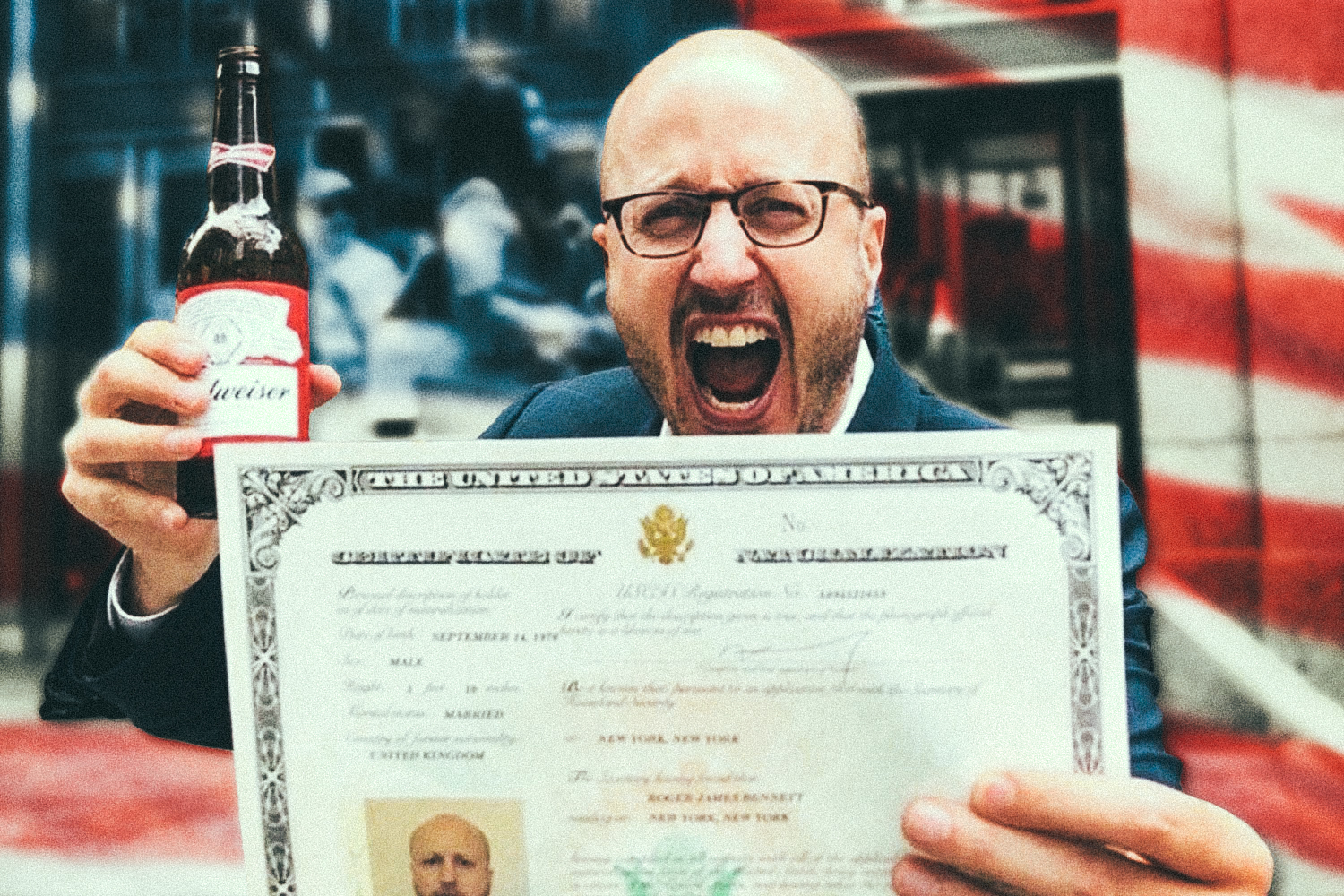 Roger Bennett celebrates American citizenship, holding his certificate and raising a bottle of beer