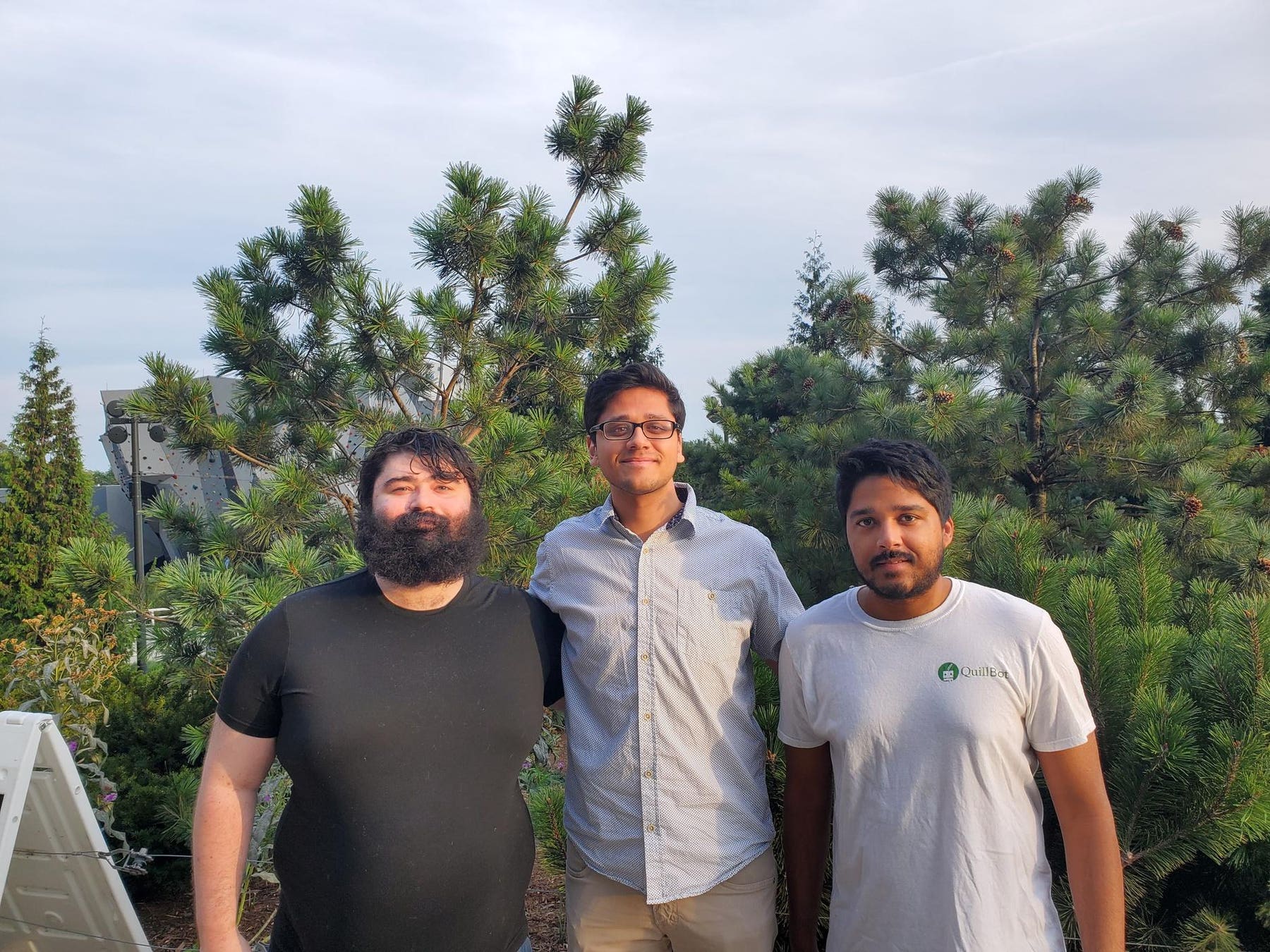 QuillBot co-founders David Silin, Rohan Gupta and Anil Jason standing outdoors