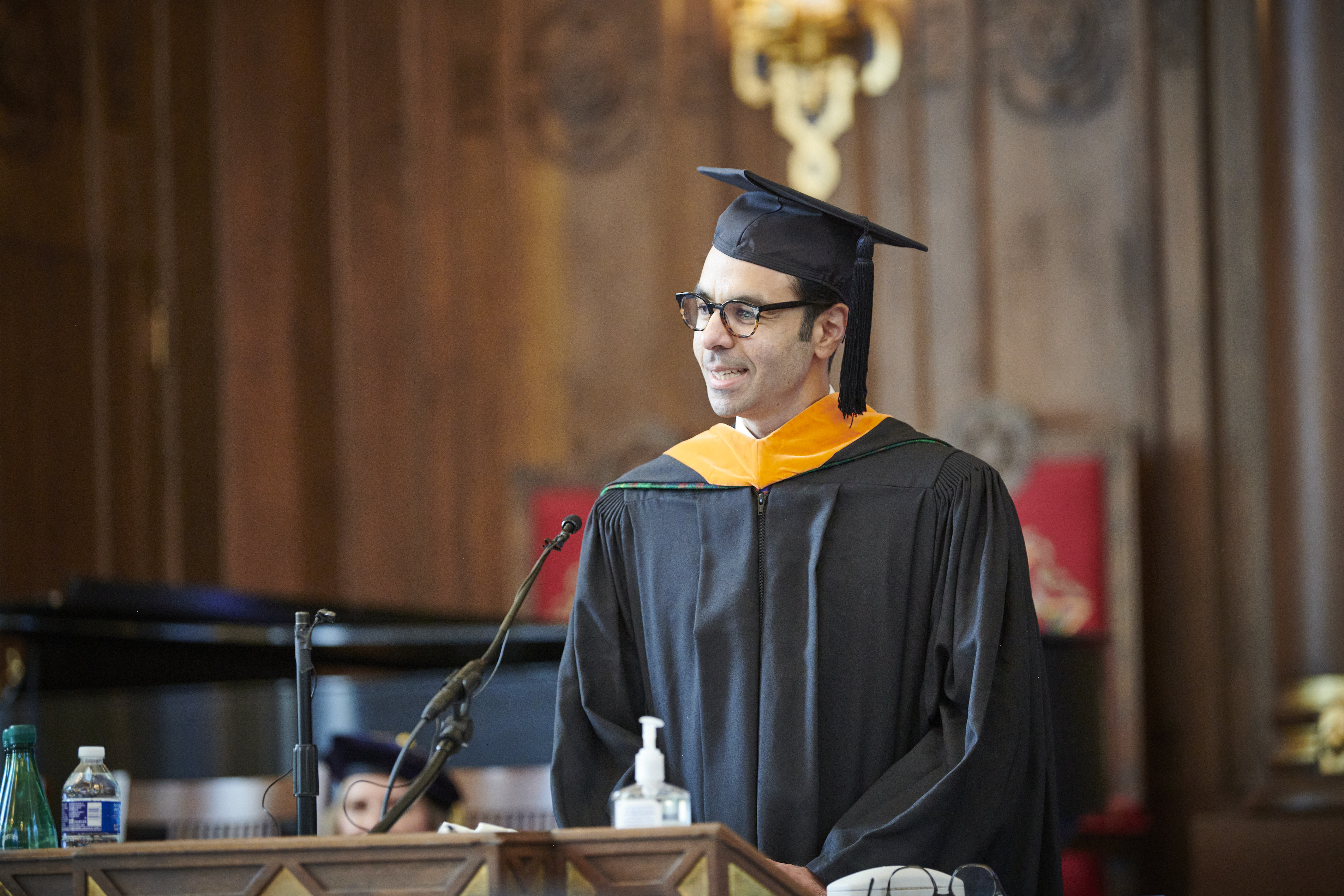 Rohyt Belani in academic robes speaking at Carnegie Mellon's INI diploma ceremony in May 2023.
