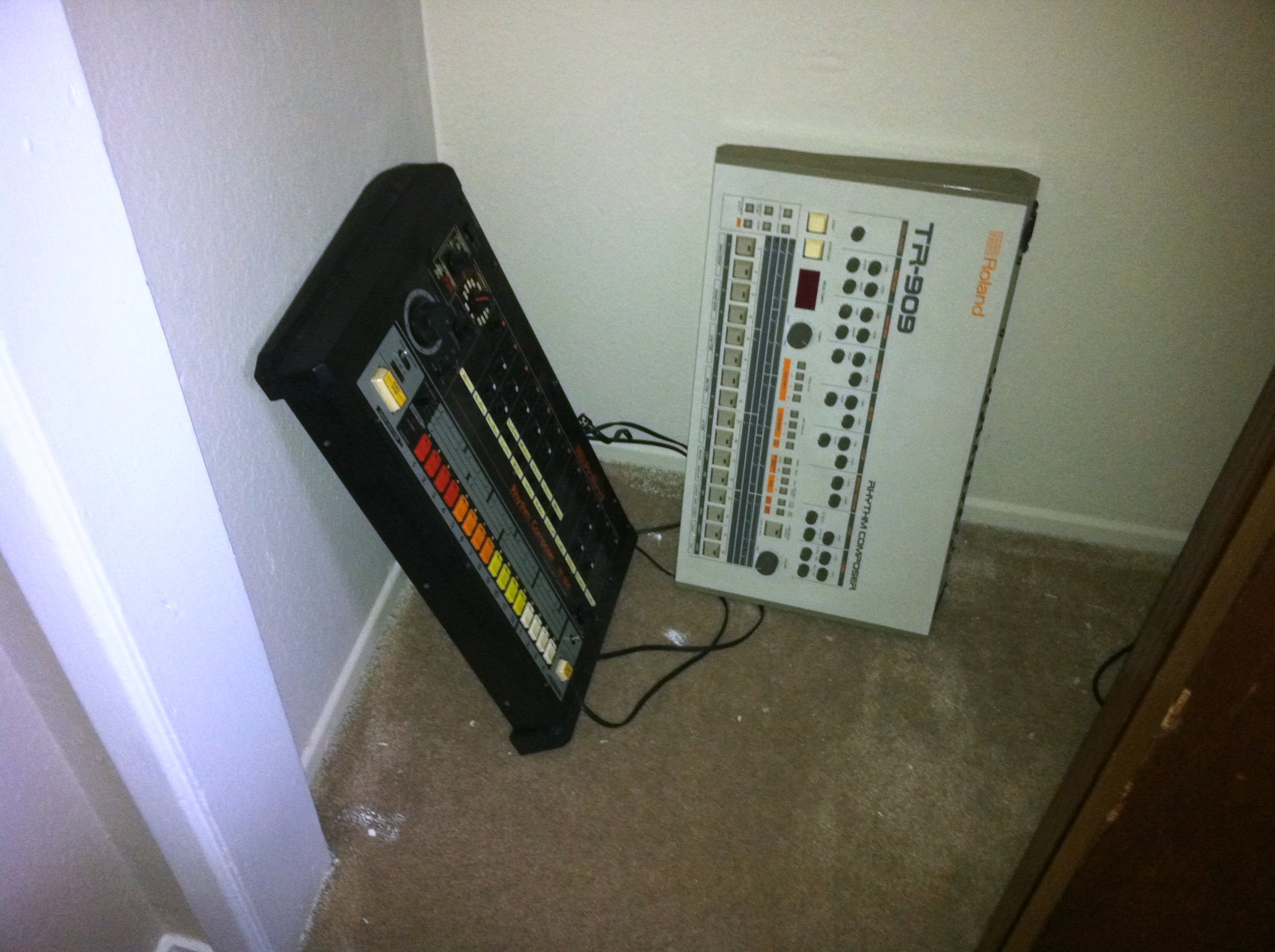 Roland TR-808 and TR-909 drum machines side by side