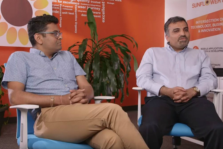 Sunflower Lab co-founders Yash Patel and Ronak Patel seated together for their founders' video