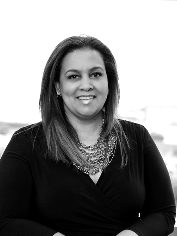 Black-and-white press portrait of Ronel Lundall accompanying her 2018 EMpower recognition