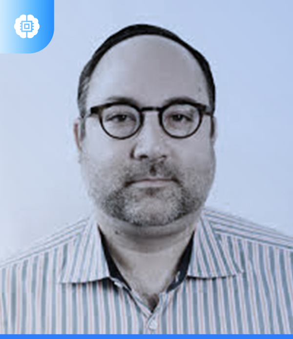 Ronen Lazar wearing glasses and a striped shirt in a press photograph for The Retail Podcast