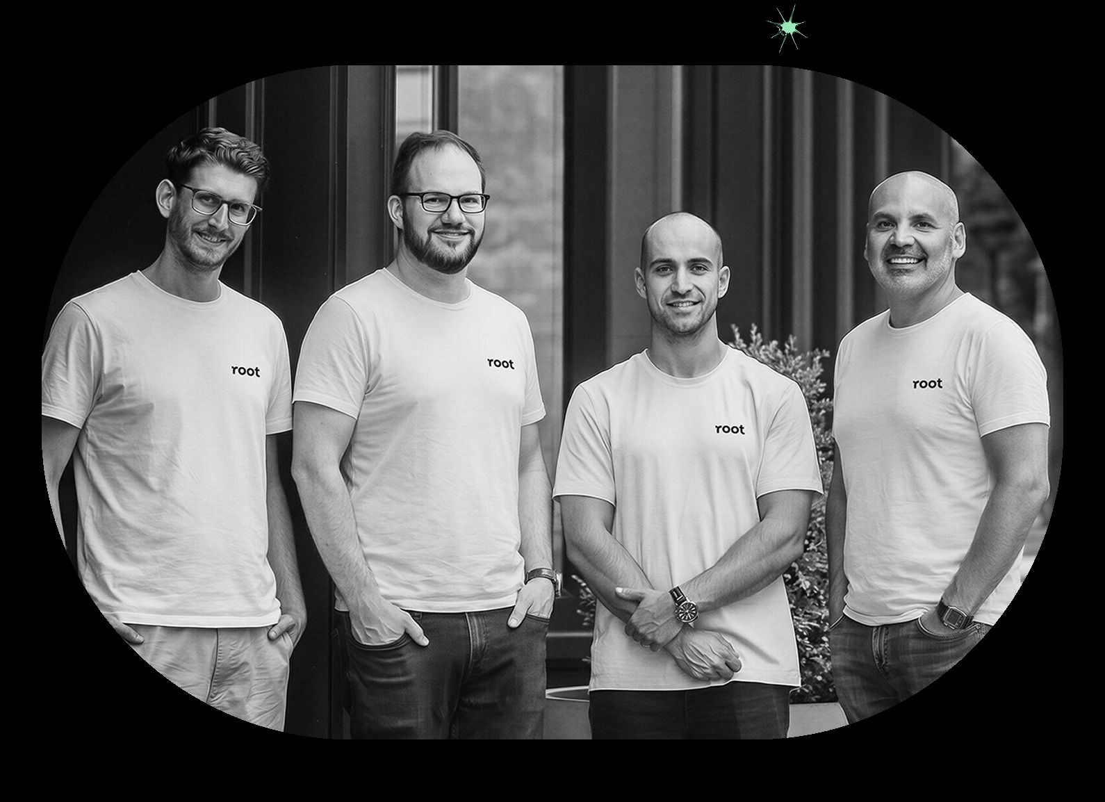 Four members of the Root team wearing white Root shirts