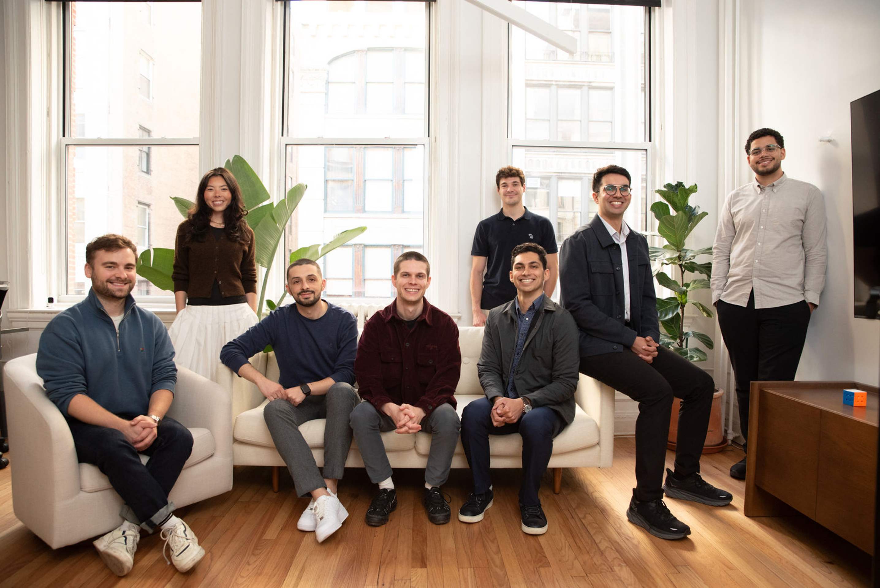 Knot team members, including Rory and Kieran O’Reilly, gathered in a bright office