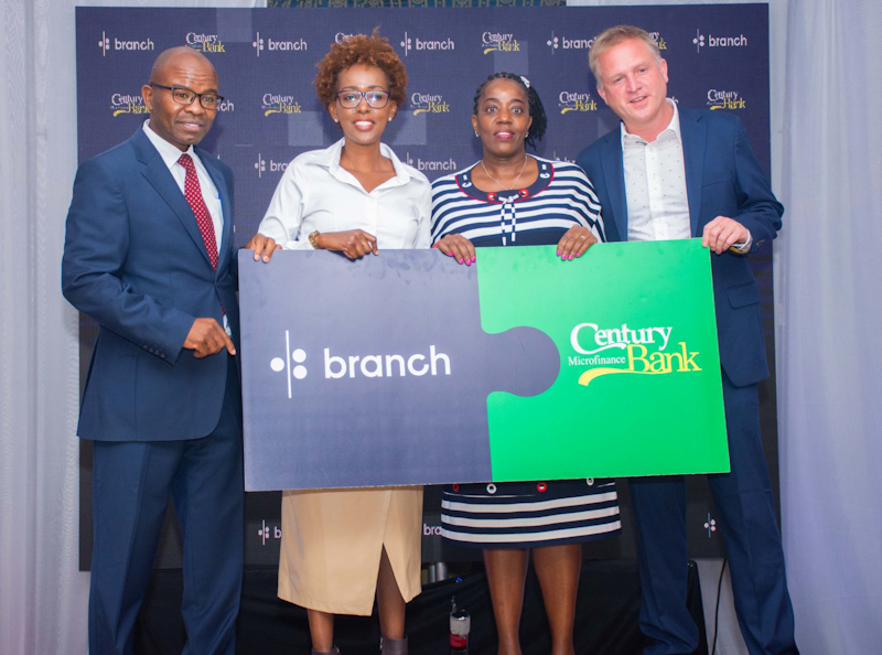 Peterson Mwangi, Rose Muturi, Florence Muchiri and Matt Flannery hold interlocking Branch and Century signs at the acquisition ceremony