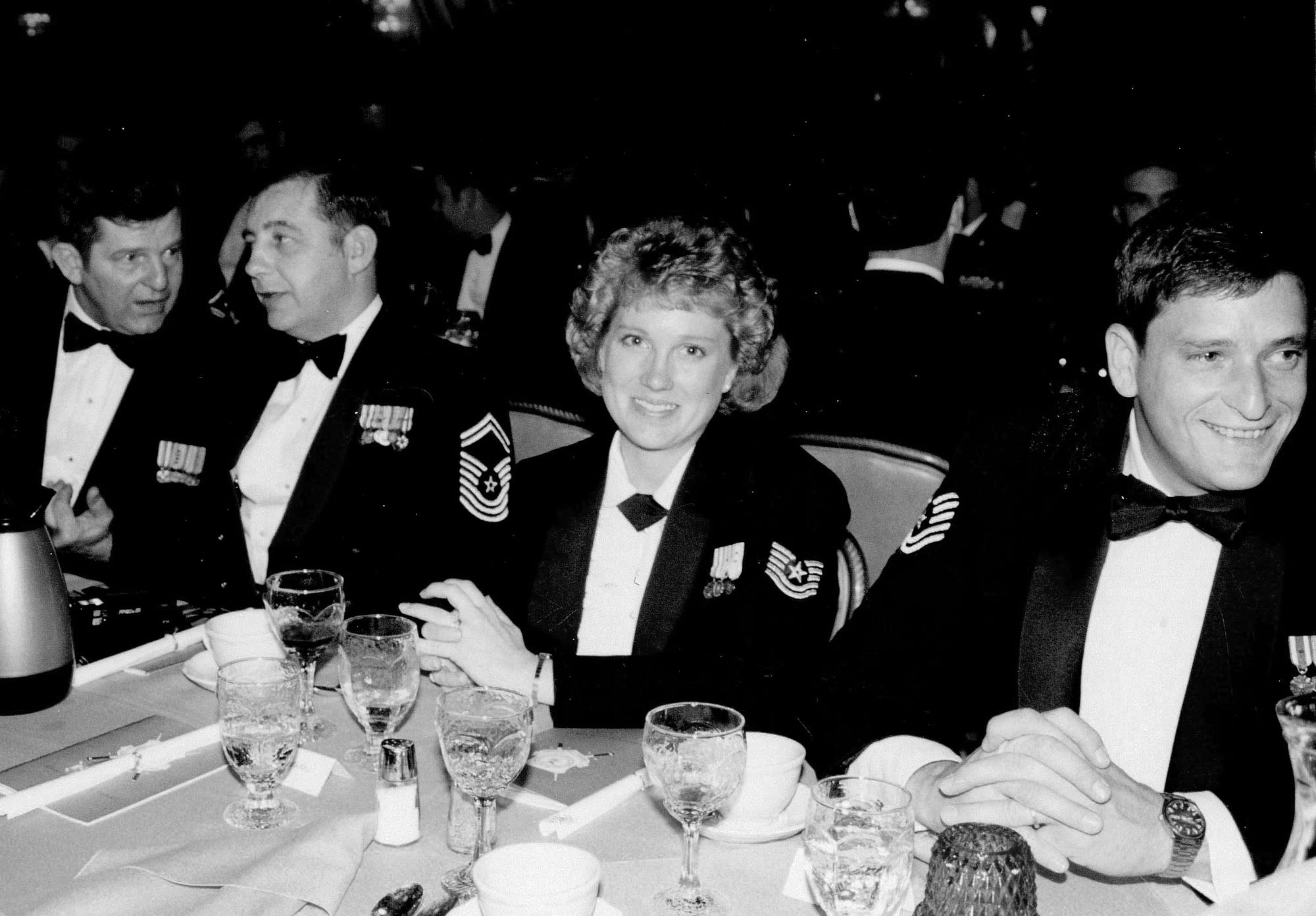 Rosemary Johnston, center, in Air Force dress uniform at a formal event