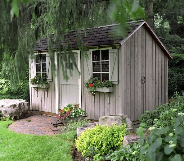 Garden storage shed surrounded by plants, photographed for RTO National’s website