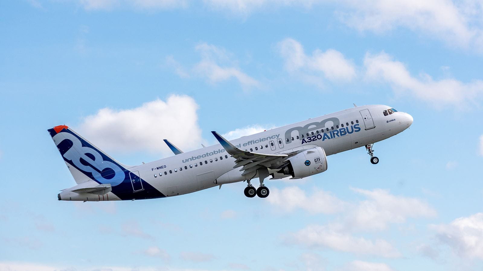 Airbus A320neo test aircraft in flight, with engines visible beneath its wings