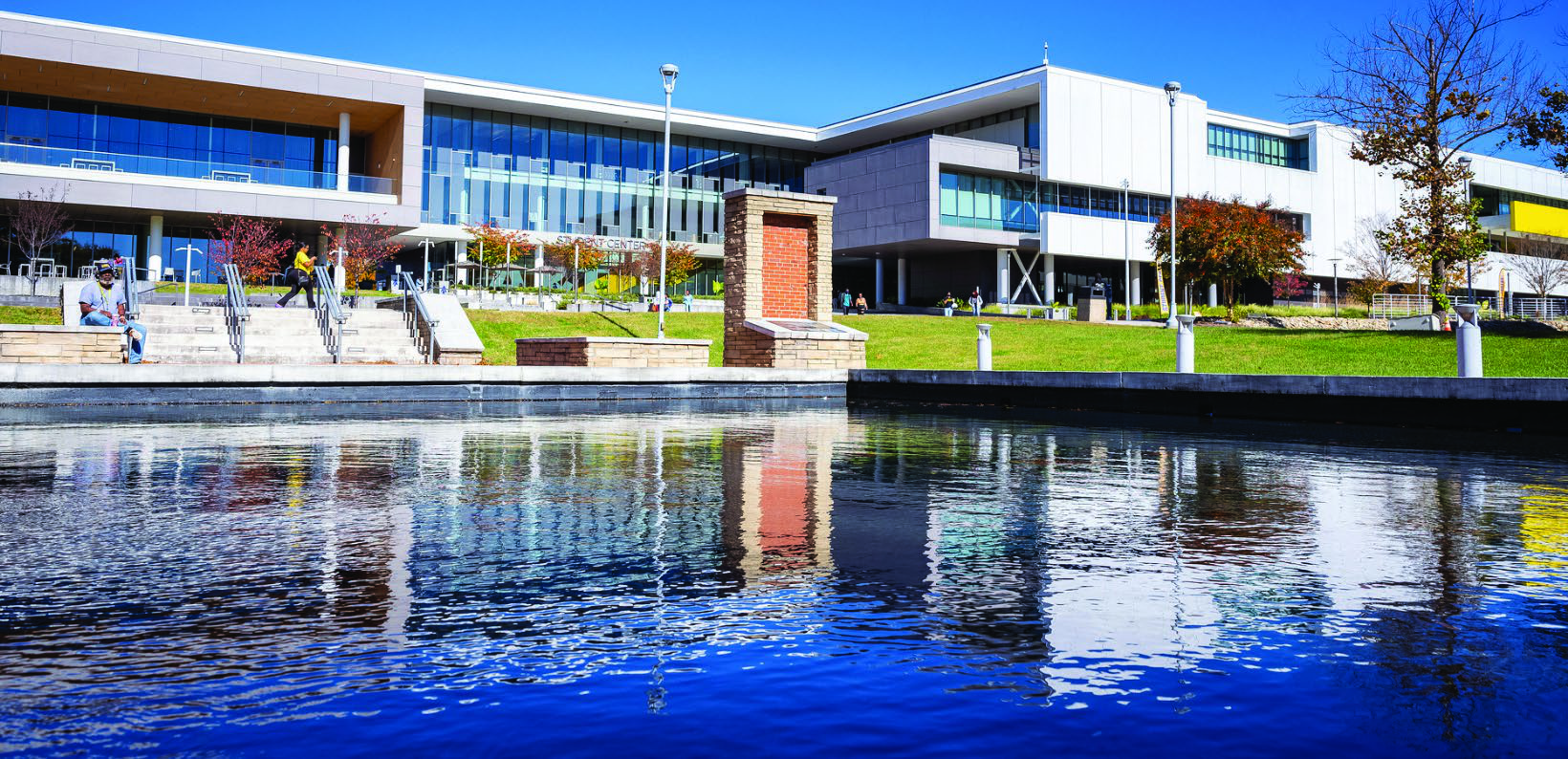 North Carolina A&T campus buildings reflected in a pond