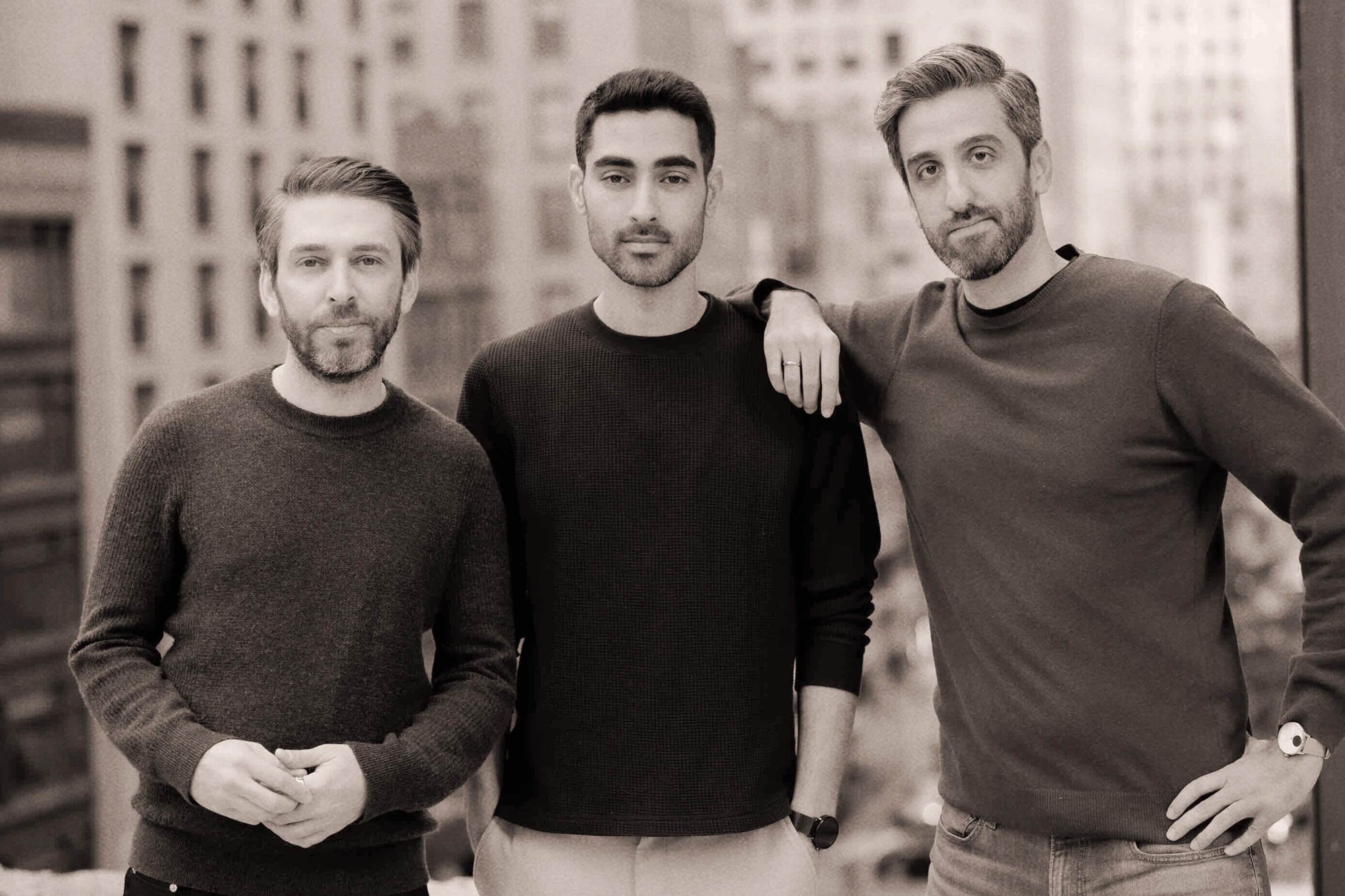 Runlayer founders Andrew Berman, Tal Peretz and Vitor Balocco standing together in New York