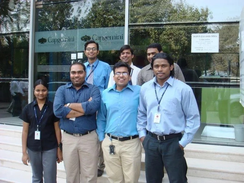 Colleagues outside a Capgemini office in a photograph from Rupesh Garg’s career gallery