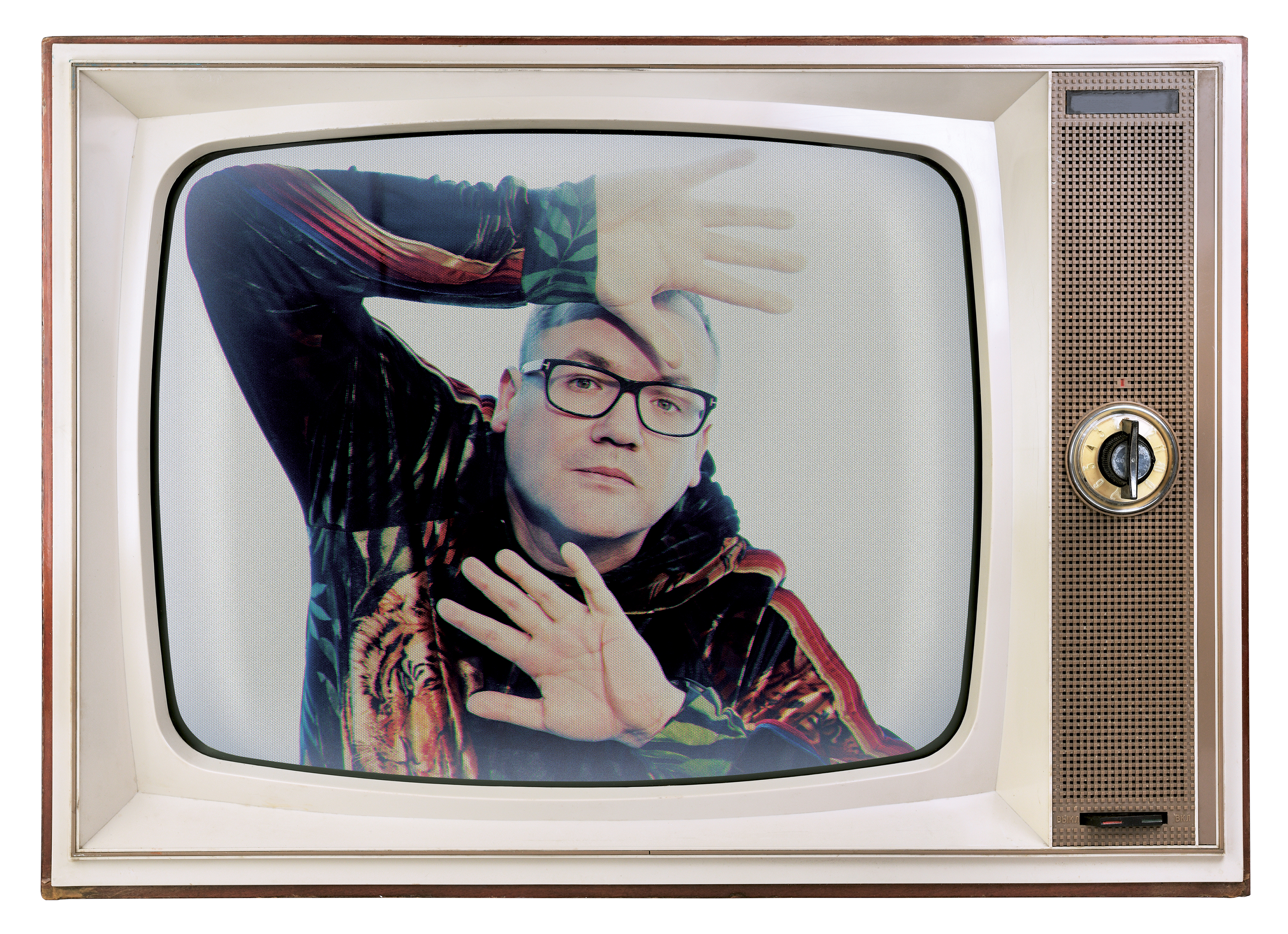 Editorial photograph of Ruslan Kogan framed inside a vintage television