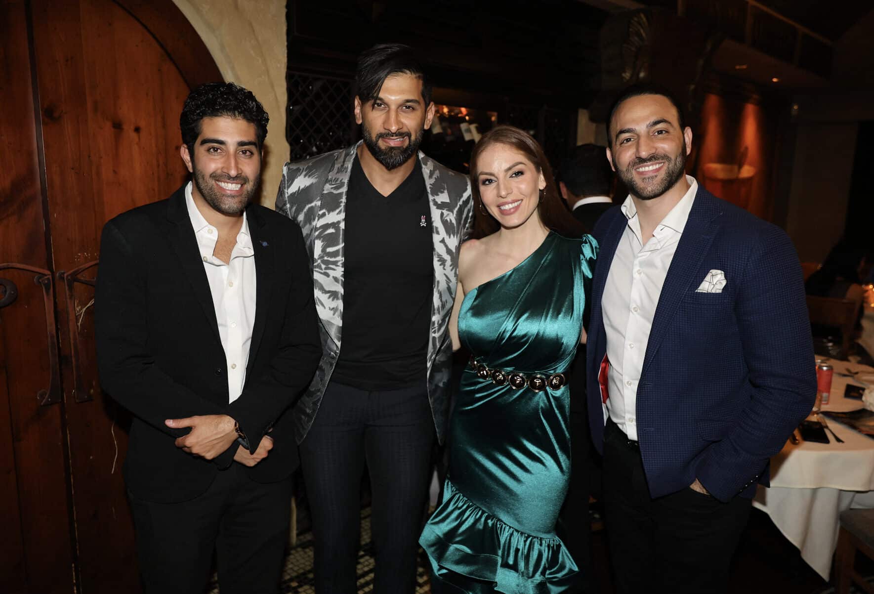 Kambiz Ahmadi, Omar Sharif, Brittany Michalchuk and Ryan Faridian at a Vancouver entrepreneurs gathering; Faridian stands at right.