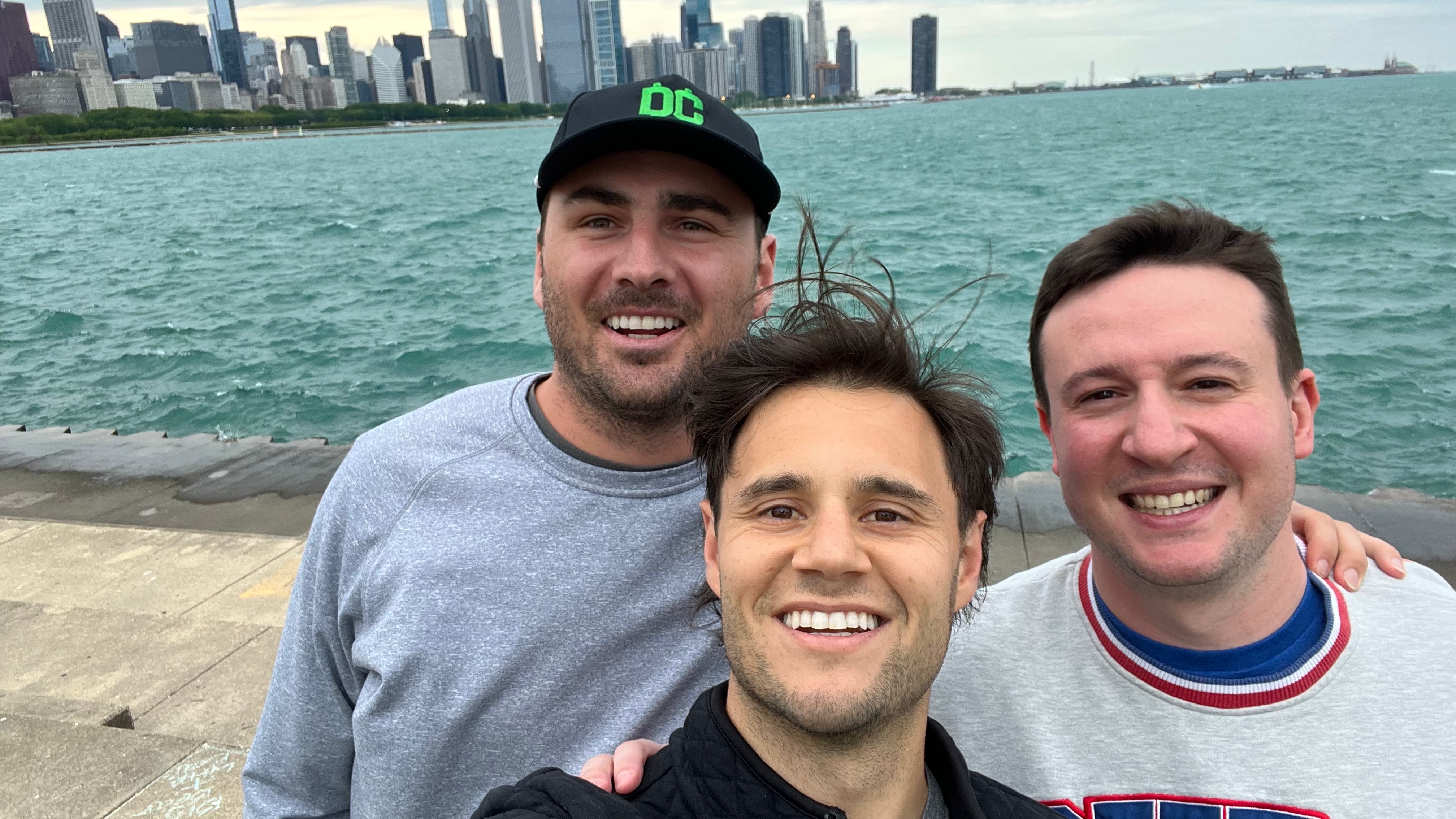 The three DubClub founders together beside the Chicago waterfront