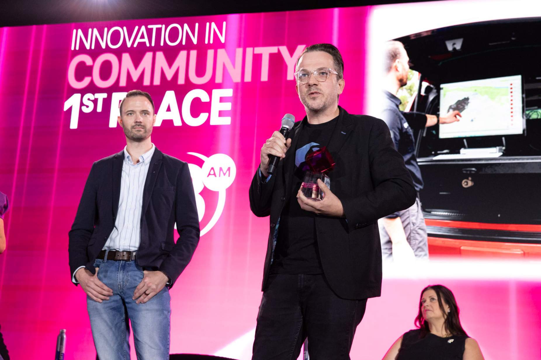 Ryan Litt and Patrick O’Connor onstage accepting the Innovation in Community award