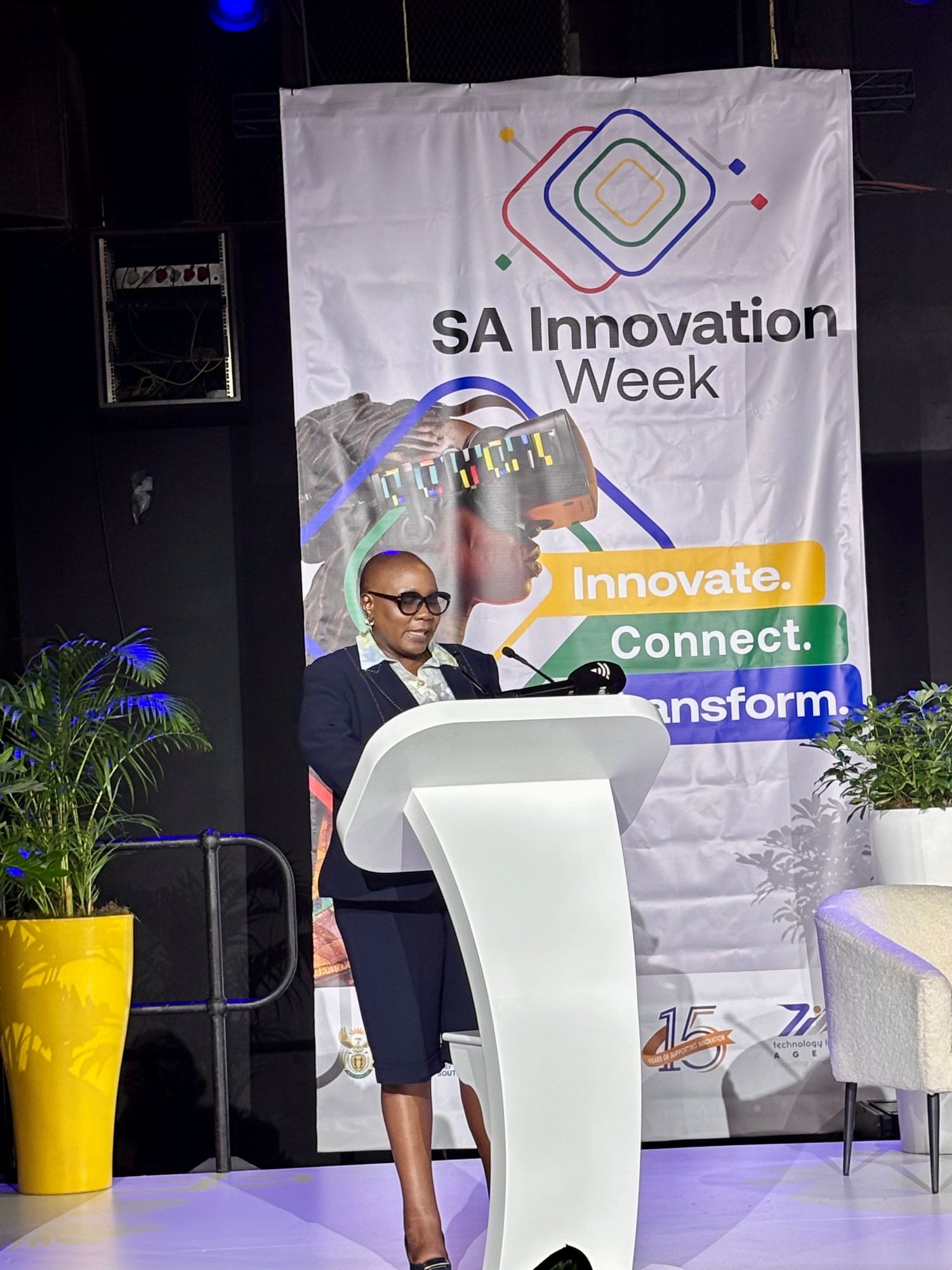 Deputy Minister Nomalungelo Gina speaking at a lectern during the inaugural SA Innovation Week