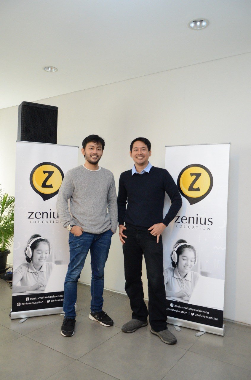 Sabda PS on the left and his brother Wisnu Subekti beside Zenius banners