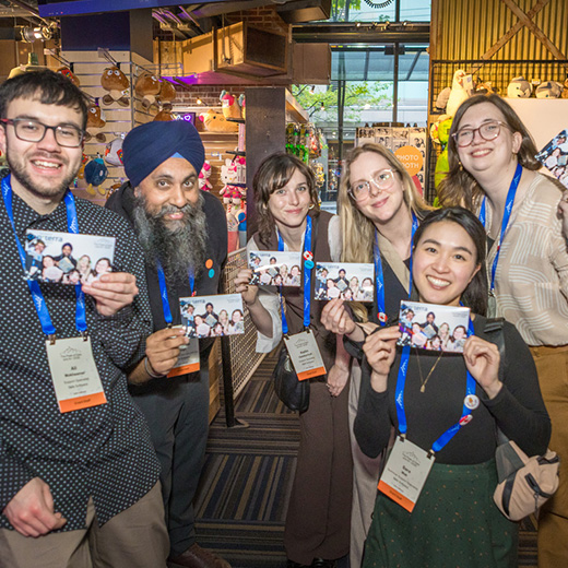 Safe Software team members smiling together at a company event